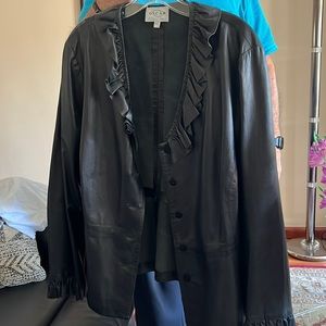 Oscar de la renta thin and light leather jacket. Very chic.